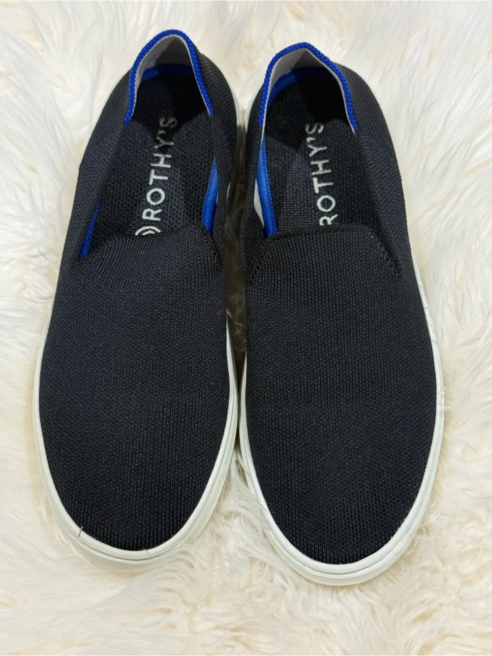 Rothy's Black Knit Slip-On Sneakers with Blue Accent